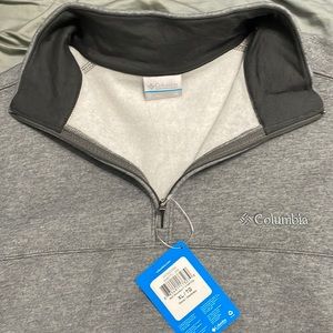 New with tags long sleeve Columbia 3/4 zip up. Never worn XL.
